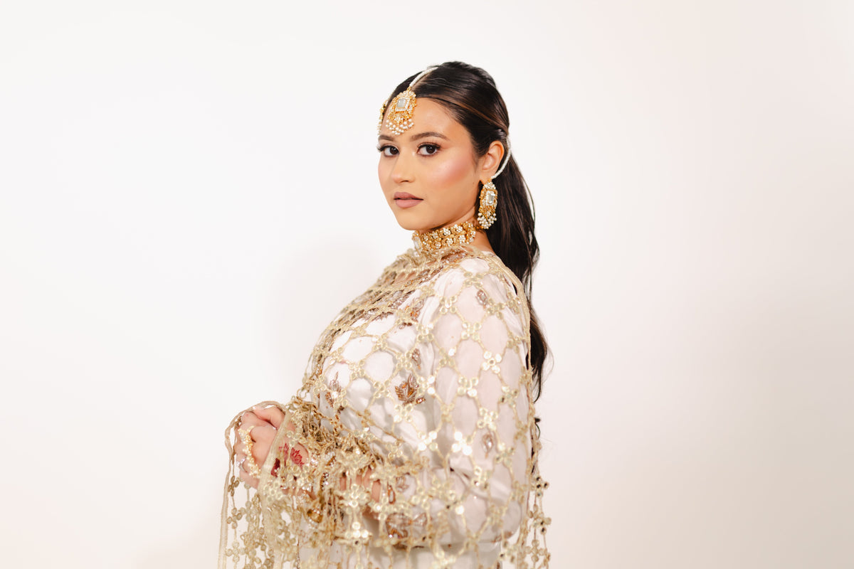 N A J M A C O U T U R E