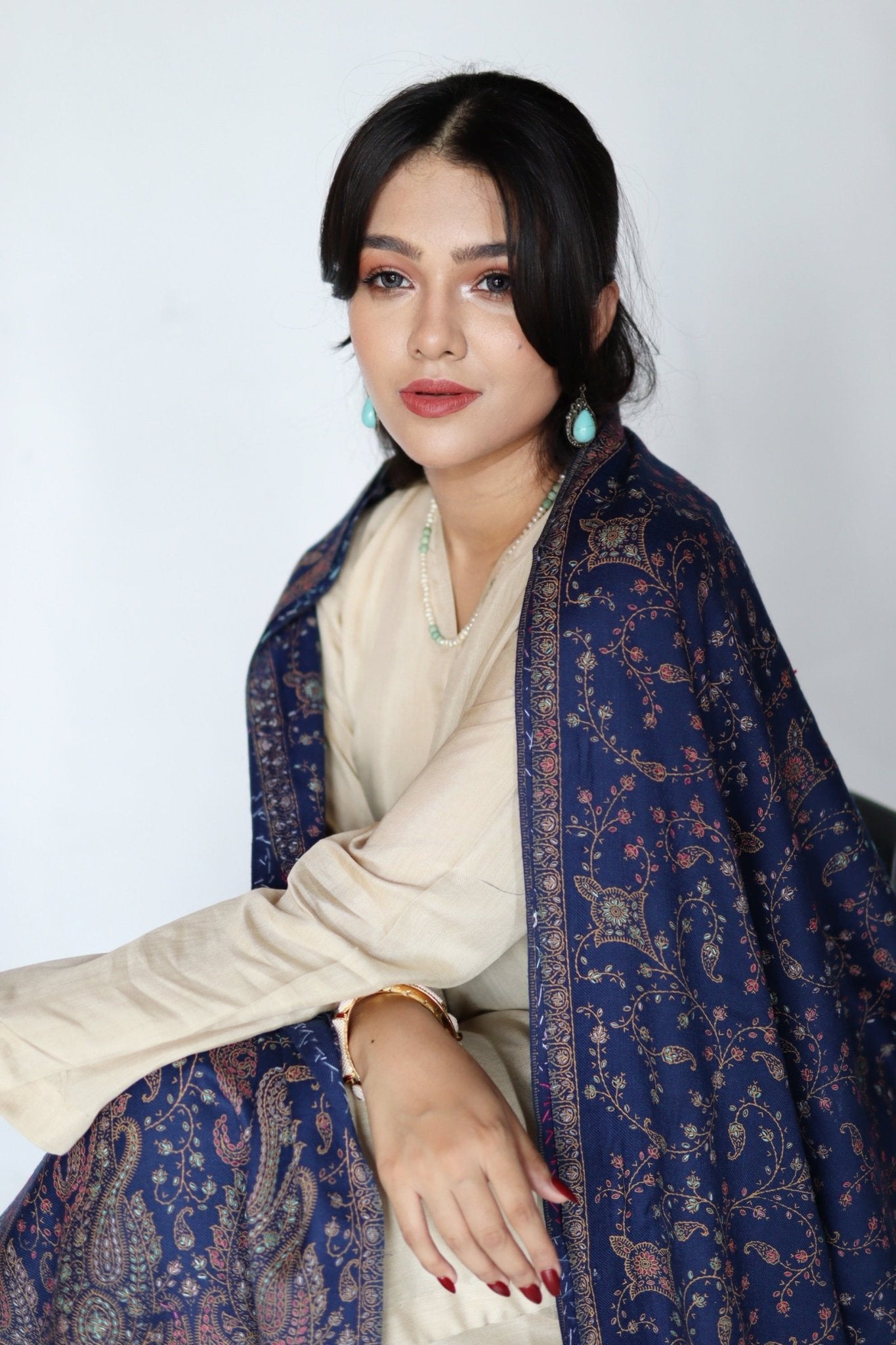 • Clothing: Embroidered/Printed suit for women - Made of best quality fabric - lawn or linen or chiffon - pure silk - Available at Najma Designs & Co. • Jewelry: Gold - plated stud earrings for