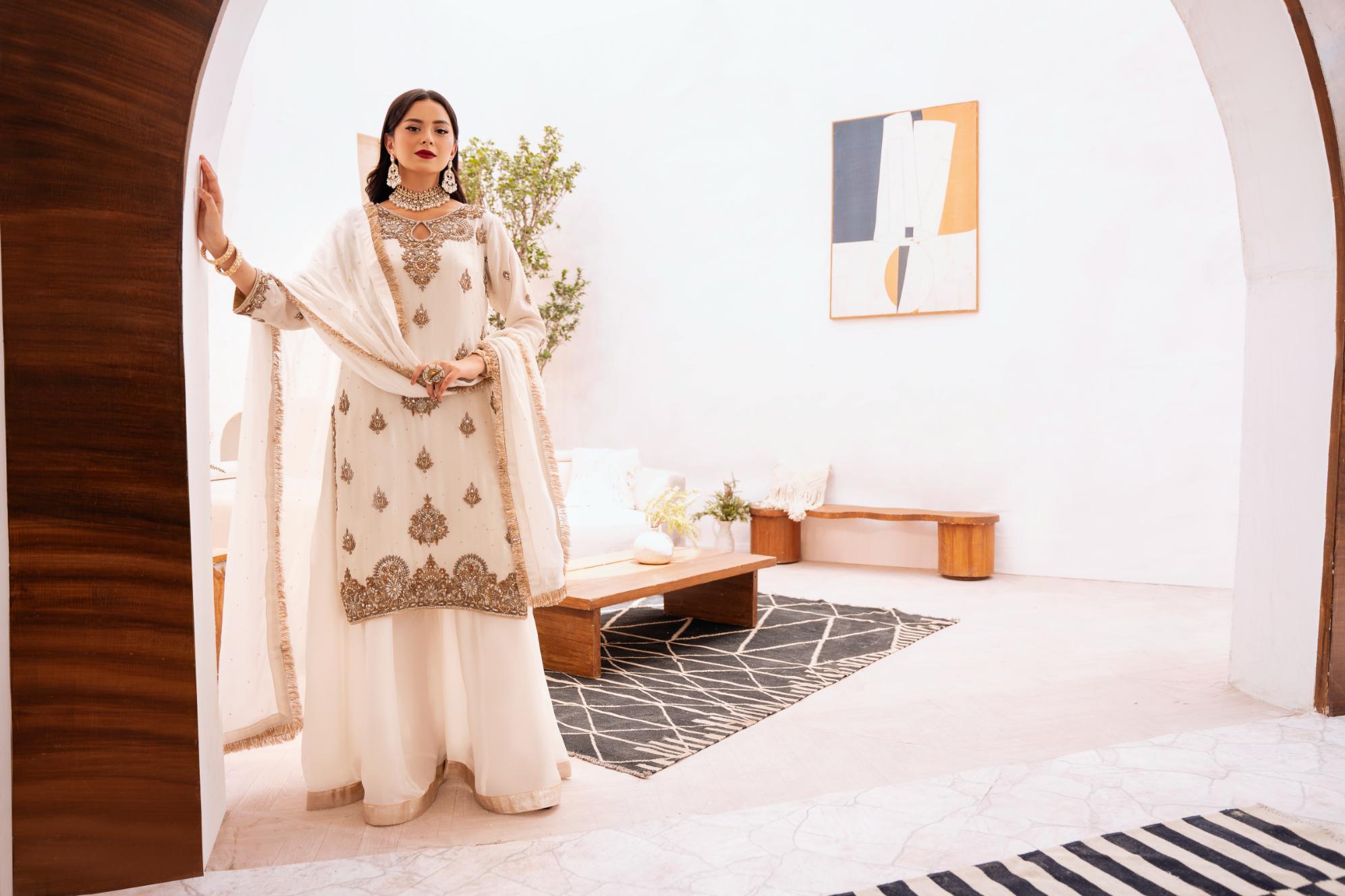 • Clothing: Embroidered/Printed suit for women - Made of best quality fabric - lawn or linen or chiffon - pure silk - Available at Najma Designs & Co. • Jewelry: Gold - plated stud earrings for
