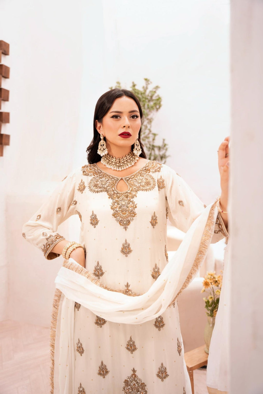 • Clothing: Embroidered/Printed suit for women - Made of best quality fabric - lawn or linen or chiffon - pure silk - Available at Najma Designs & Co. • Jewelry: Gold - plated stud earrings for
