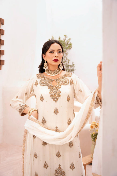 • Clothing: Embroidered/Printed suit for women - Made of best quality fabric - lawn or linen or chiffon - pure silk - Available at Najma Designs & Co. • Jewelry: Gold - plated stud earrings for