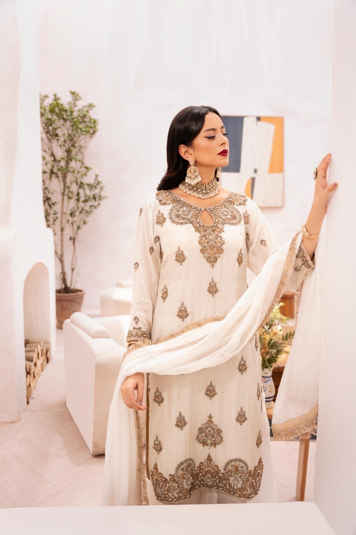 • Clothing: Embroidered/Printed suit for women - Made of best quality fabric - lawn or linen or chiffon - pure silk - Available at Najma Designs & Co. • Jewelry: Gold - plated stud earrings for