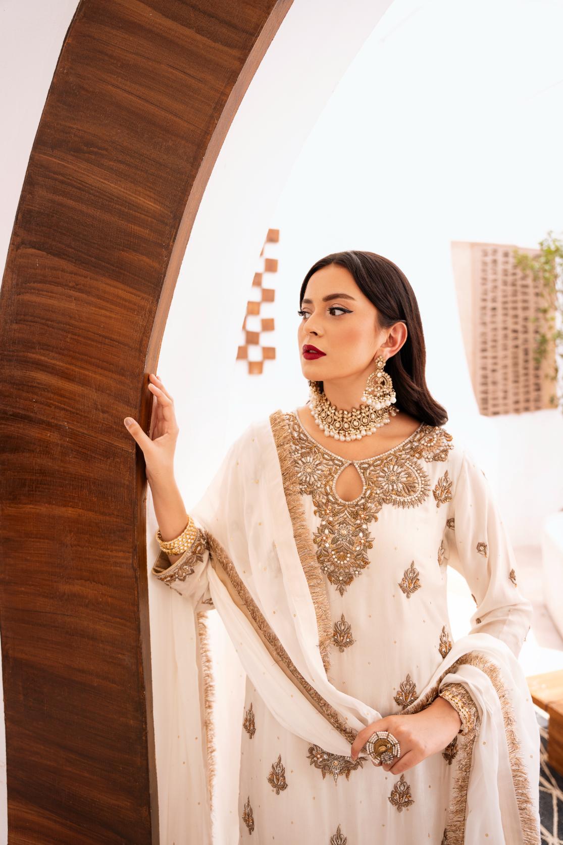 • Clothing: Embroidered/Printed suit for women - Made of best quality fabric - lawn or linen or chiffon - pure silk - Available at Najma Designs & Co. • Jewelry: Gold - plated stud earrings for