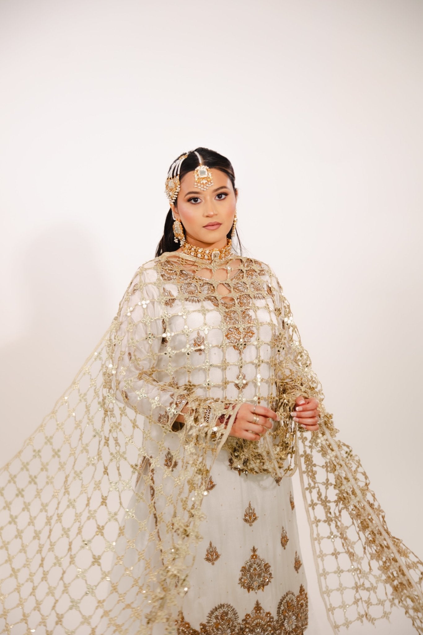 • Clothing: Embroidered/Printed suit for women - Made of best quality fabric - lawn or linen or chiffon - pure silk - Available at Najma Designs & Co. • Jewelry: Gold - plated stud earrings for