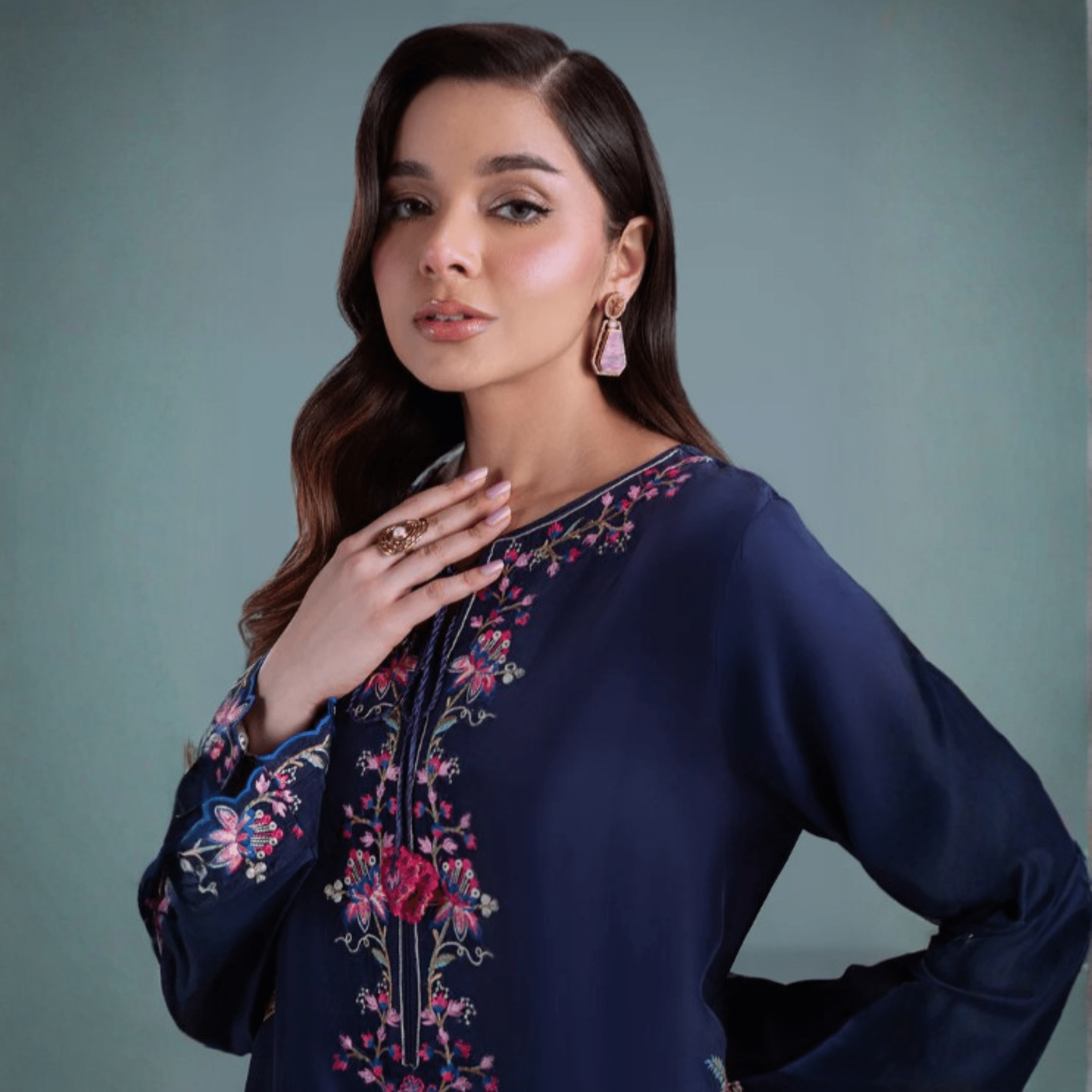 • Clothing: Embroidered/Printed suit for women - Made of best quality fabric - lawn or linen or chiffon - pure silk - Available at Najma Designs & Co. • Jewelry: Gold - plated stud earrings for