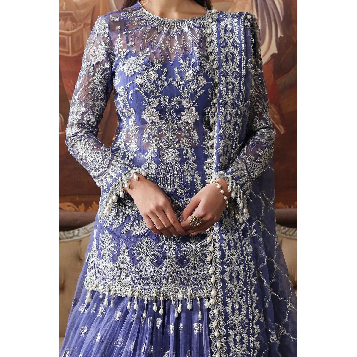 • Clothing: Embroidered/Printed suit for women - Made of best quality fabric - lawn or linen or chiffon - pure silk - Available at Najma Designs & Co. • Jewelry: Gold - plated stud earrings for