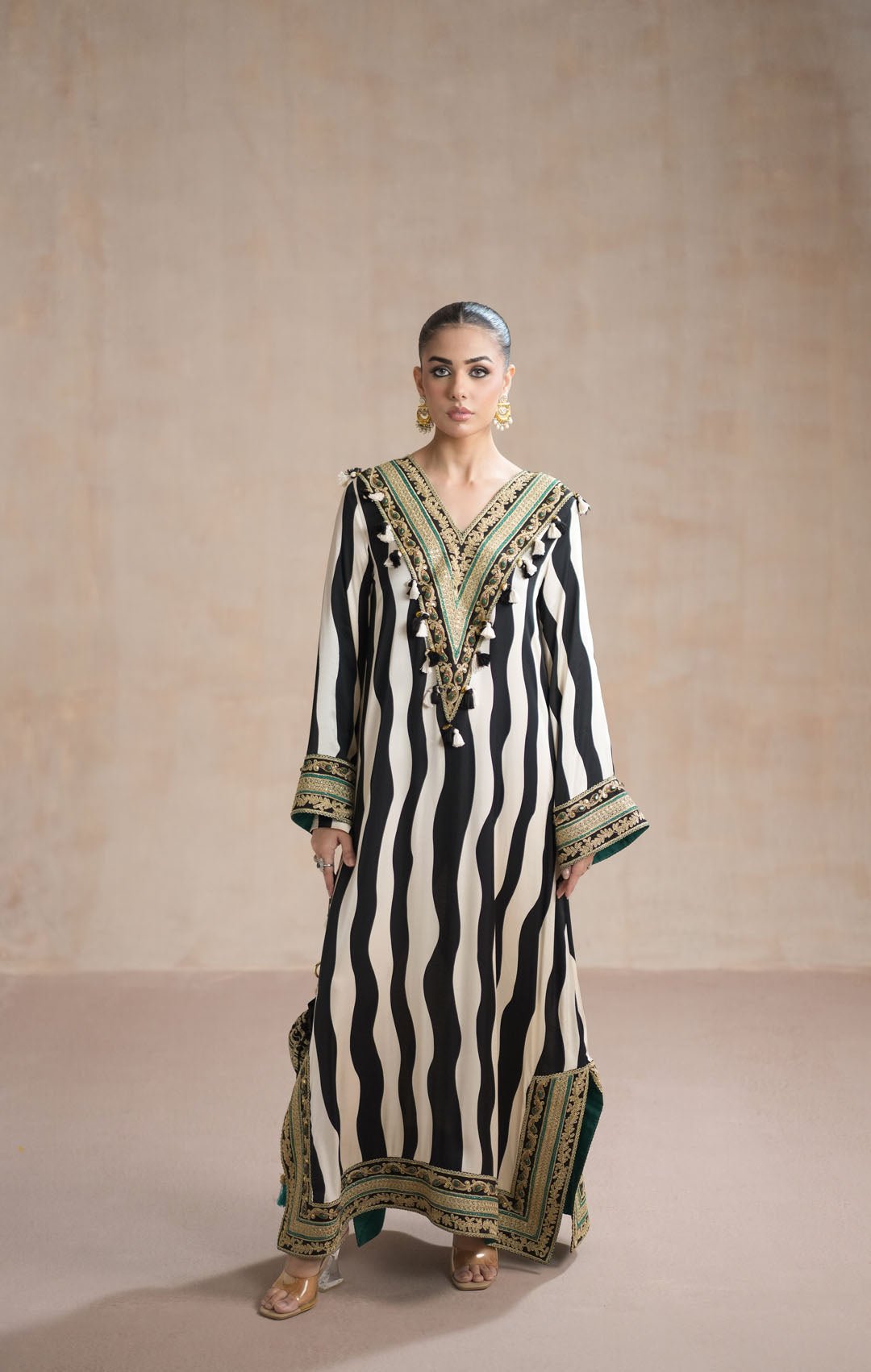 • Clothing: Embroidered/Printed suit for women - Made of best quality fabric - lawn or linen or chiffon - pure silk - Available at Najma Designs & Co. • Jewelry: Gold - plated stud earrings for