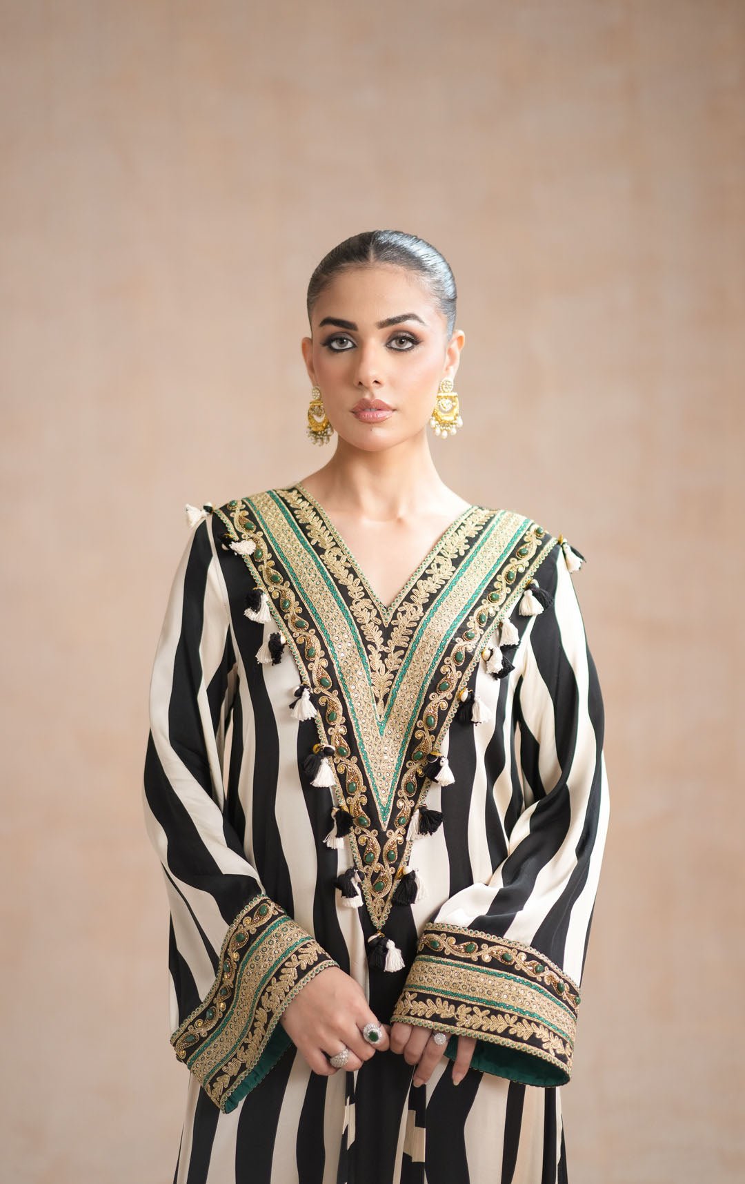 • Clothing: Embroidered/Printed suit for women - Made of best quality fabric - lawn or linen or chiffon - pure silk - Available at Najma Designs & Co. • Jewelry: Gold - plated stud earrings for
