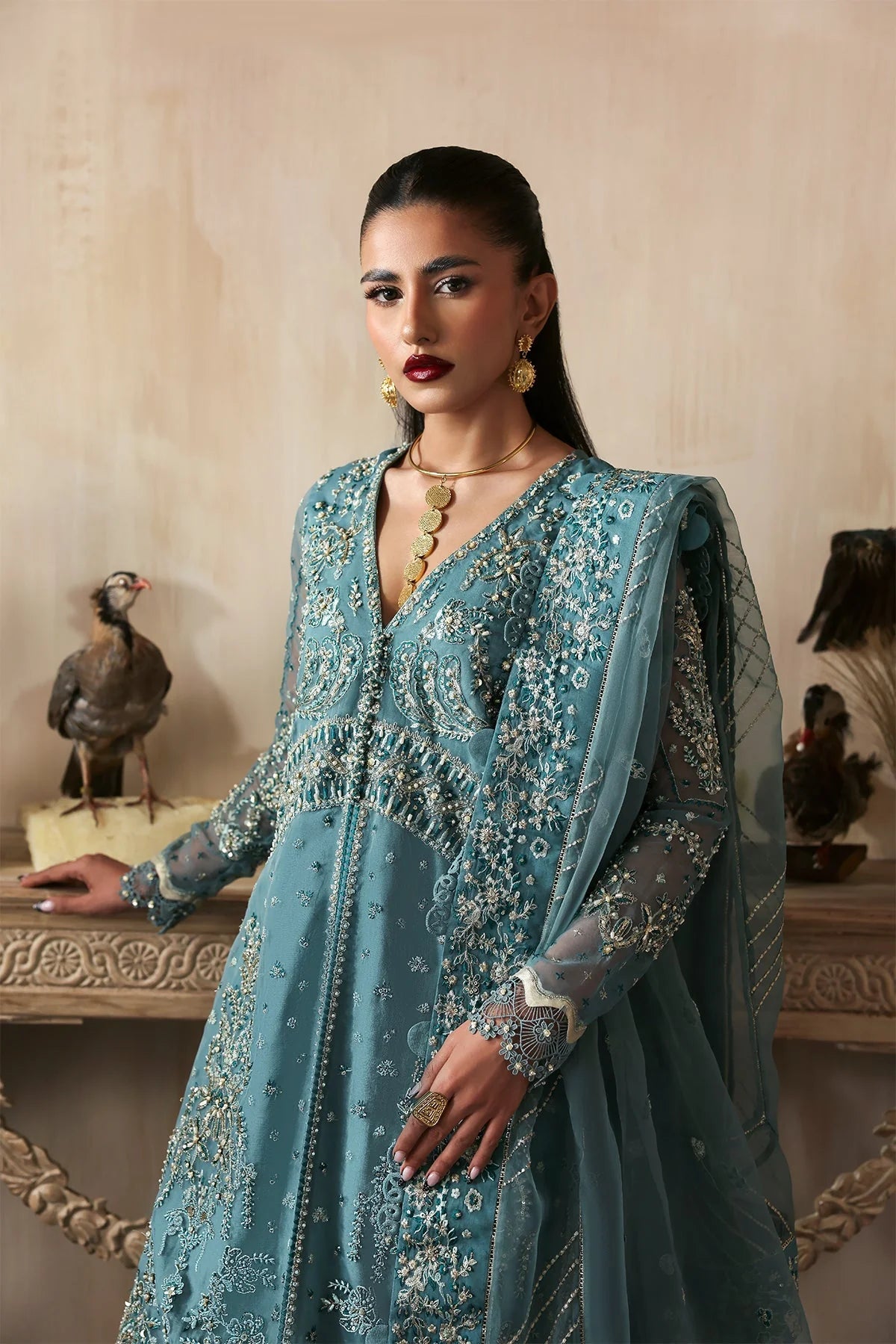 • Clothing: Embroidered/Printed suit for women - Made of best quality fabric - lawn or linen or chiffon - pure silk - Available at Najma Designs & Co. • Jewelry: Gold - plated stud earrings for
