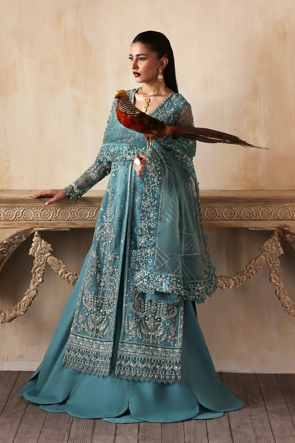 • Clothing: Embroidered/Printed suit for women - Made of best quality fabric - lawn or linen or chiffon - pure silk - Available at Najma Designs & Co. • Jewelry: Gold - plated stud earrings for