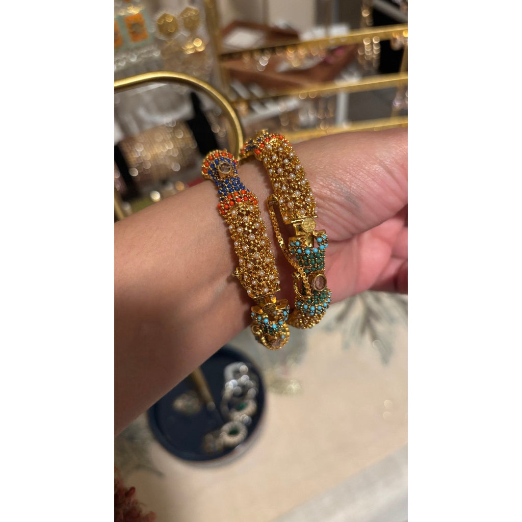 • Clothing: Embroidered/Printed suit for women - Made of best quality fabric - lawn or linen or chiffon - pure silk - Available at Najma Designs & Co. • Jewelry: Gold - plated stud earrings for