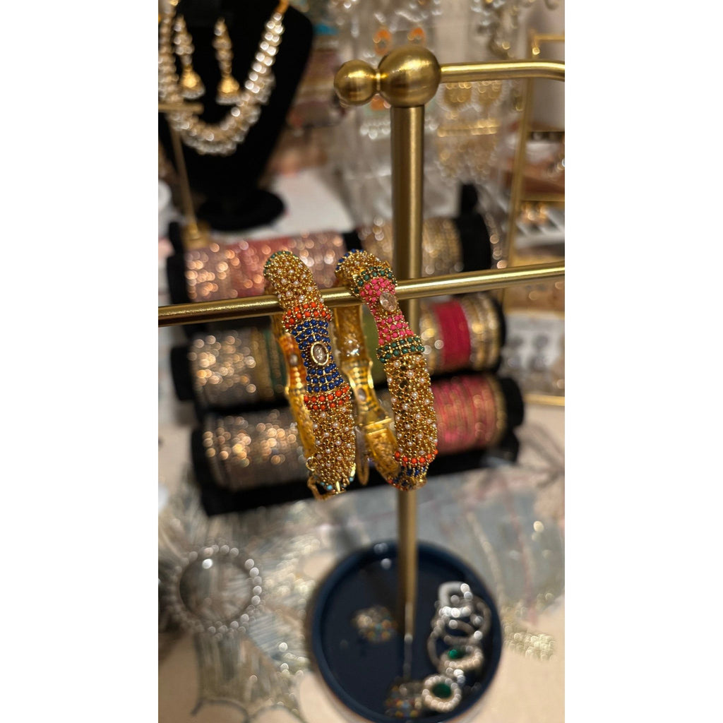 • Clothing: Embroidered/Printed suit for women - Made of best quality fabric - lawn or linen or chiffon - pure silk - Available at Najma Designs & Co. • Jewelry: Gold - plated stud earrings for