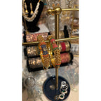 • Clothing: Embroidered/Printed suit for women - Made of best quality fabric - lawn or linen or chiffon - pure silk - Available at Najma Designs & Co. • Jewelry: Gold - plated stud earrings for