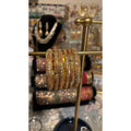 • Clothing: Embroidered/Printed suit for women - Made of best quality fabric - lawn or linen or chiffon - pure silk - Available at Najma Designs & Co. • Jewelry: Gold - plated stud earrings for