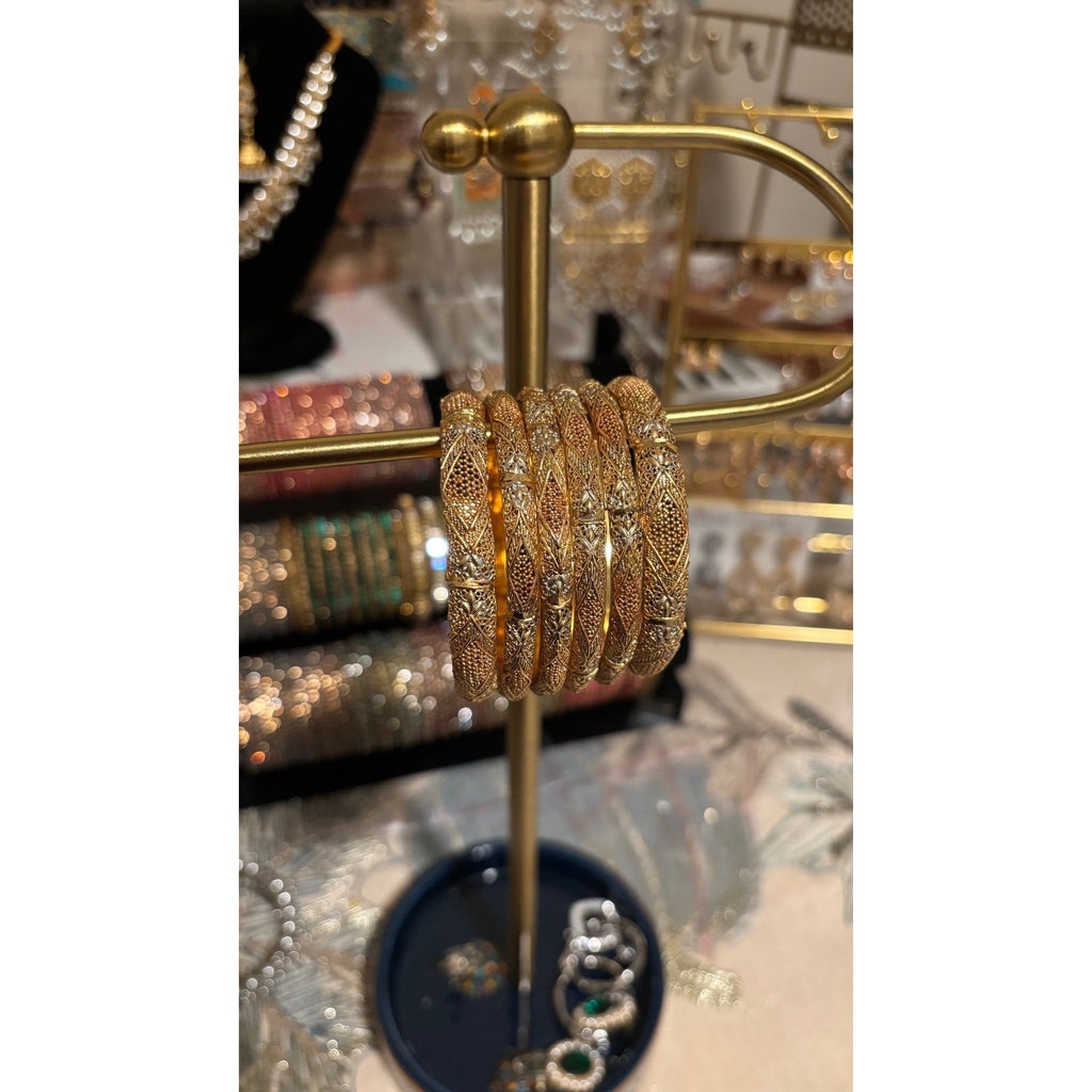 • Clothing: Embroidered/Printed suit for women - Made of best quality fabric - lawn or linen or chiffon - pure silk - Available at Najma Designs & Co. • Jewelry: Gold - plated stud earrings for