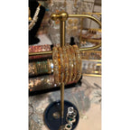 • Clothing: Embroidered/Printed suit for women - Made of best quality fabric - lawn or linen or chiffon - pure silk - Available at Najma Designs & Co. • Jewelry: Gold - plated stud earrings for