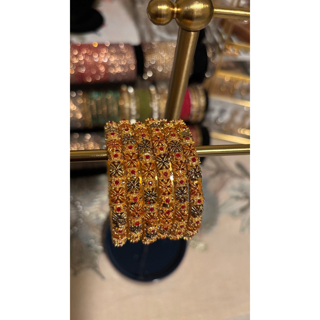 • Clothing: Embroidered/Printed suit for women - Made of best quality fabric - lawn or linen or chiffon - pure silk - Available at Najma Designs & Co. • Jewelry: Gold - plated stud earrings for