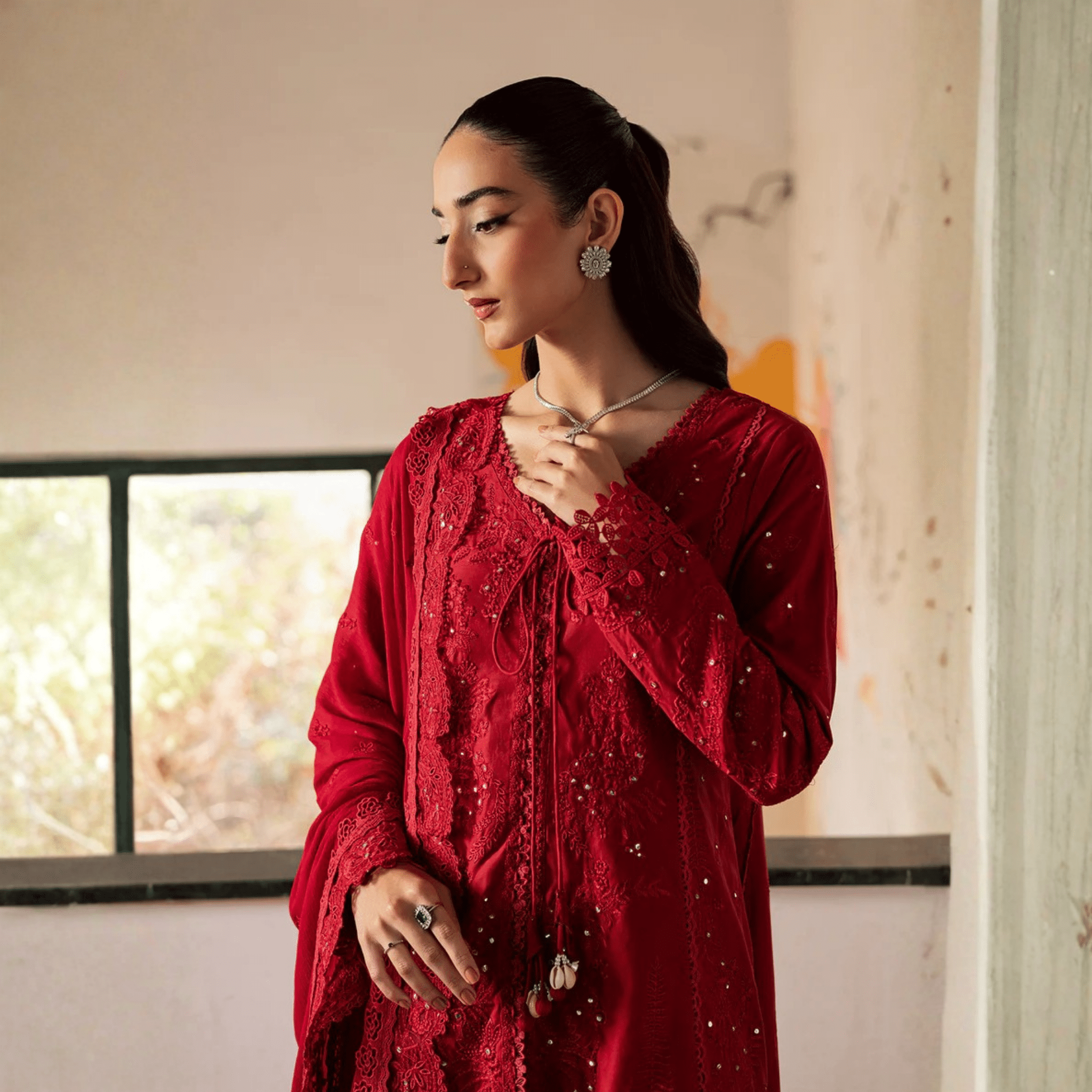 • Clothing: Embroidered/Printed suit for women - Made of best quality fabric - lawn or linen or chiffon - pure silk - Available at Najma Designs & Co. • Jewelry: Gold - plated stud earrings for