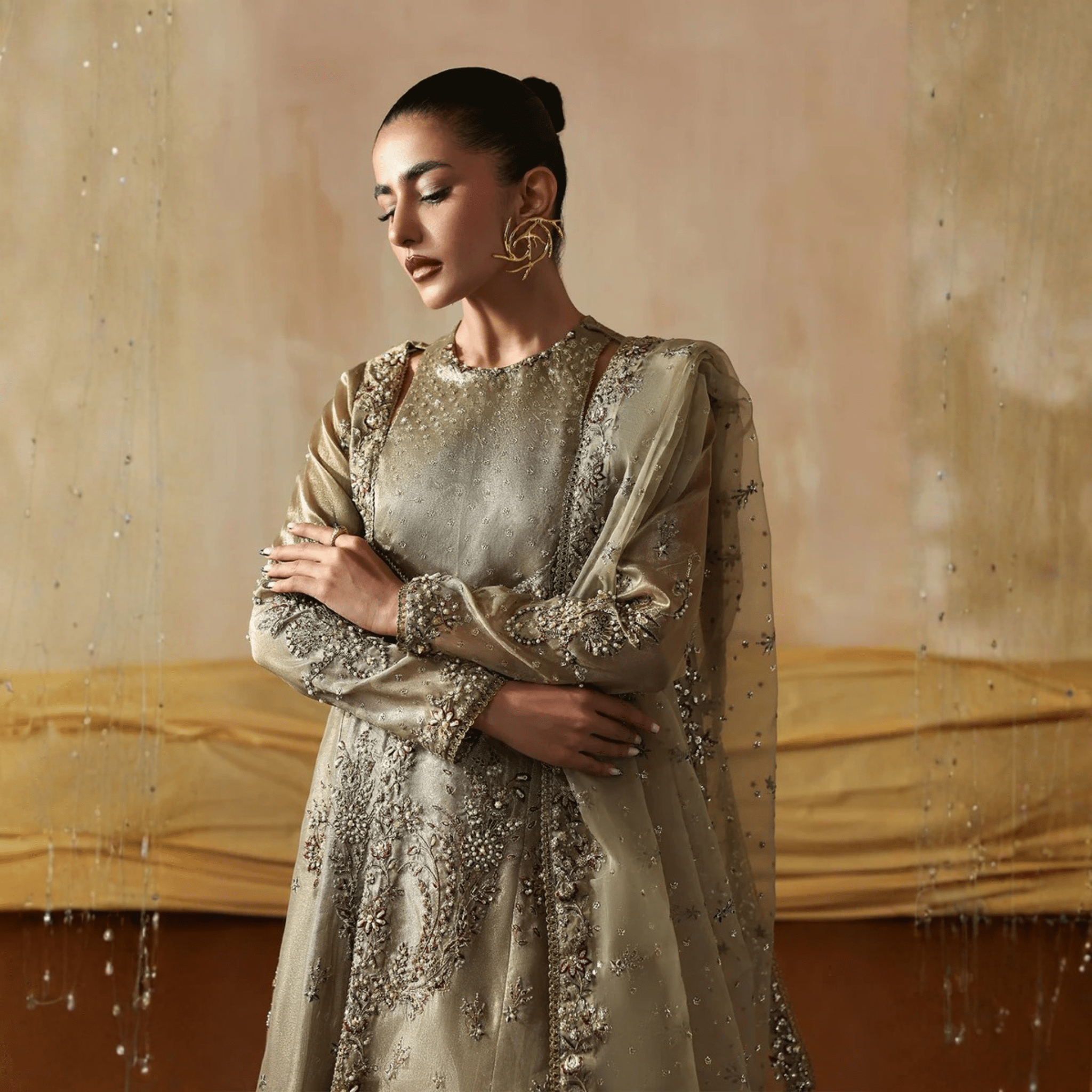 • Clothing: Embroidered/Printed suit for women - Made of best quality fabric - lawn or linen or chiffon - pure silk - Available at Najma Designs & Co. • Jewelry: Gold - plated stud earrings for