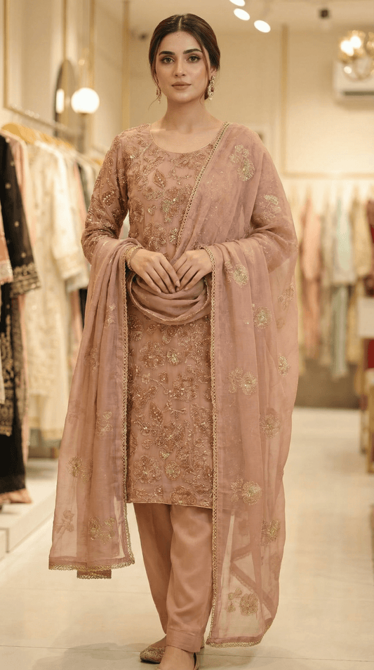 • Clothing: Embroidered/Printed suit for women - Made of best quality fabric - lawn or linen or chiffon - pure silk - Available at Najma Designs & Co. • Jewelry: Gold - plated stud earrings for