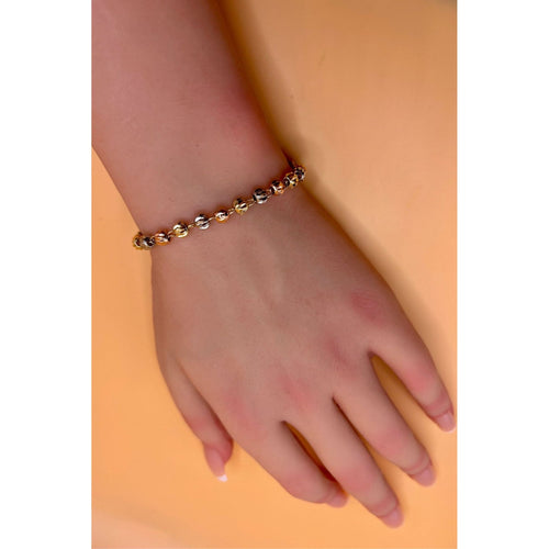 This Beads Bracelet features a unique combination of acetate, golden silver, and copper collar set on high-quality gold plated material. Expertly crafted, this bracelet offers a touch of elegance and sophistication to any outfit. Elevate your style with this exquisite accessory.