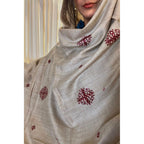 A beautiful light gray brown shawl with maroon embroidery. It is lightweight and suitable for both casual and formal wear. The brand name is Stylo Pk. It is available for purchase in the United States at Najmadesighns and Co.