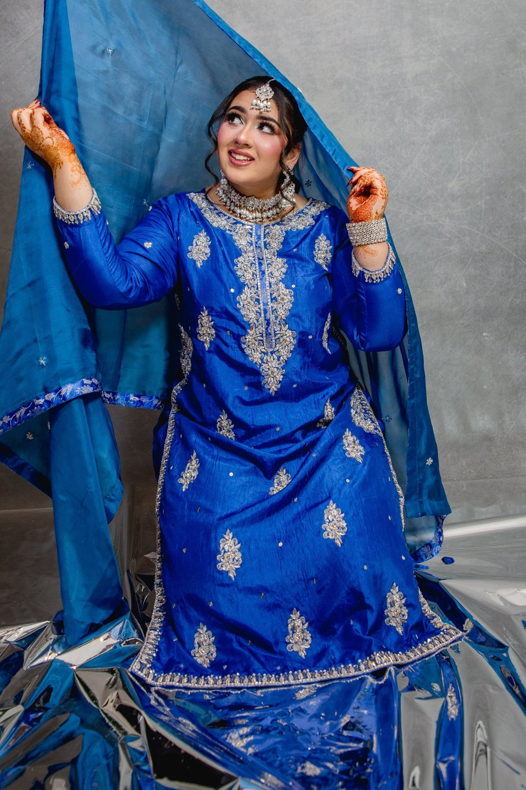 • Clothing: Embroidered/Printed suit for women - Made of best quality fabric - lawn or linen or chiffon - pure silk - Available at Najma Designs & Co. • Jewelry: Gold - plated stud earrings for
