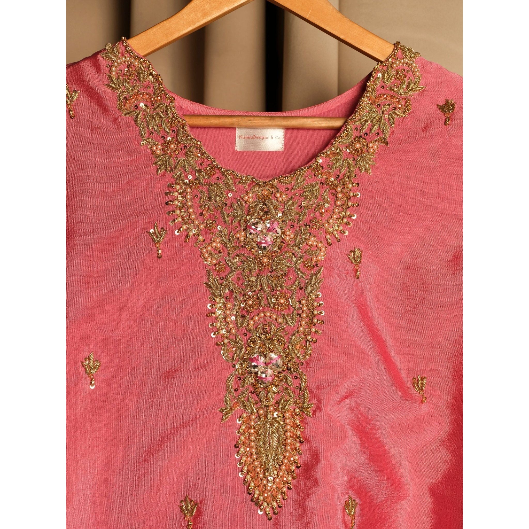 • Clothing: Embroidered/Printed suit for women - Made of best quality fabric - lawn or linen or chiffon - pure silk - Available at Najma Designs & Co. • Jewelry: Gold - plated stud earrings for