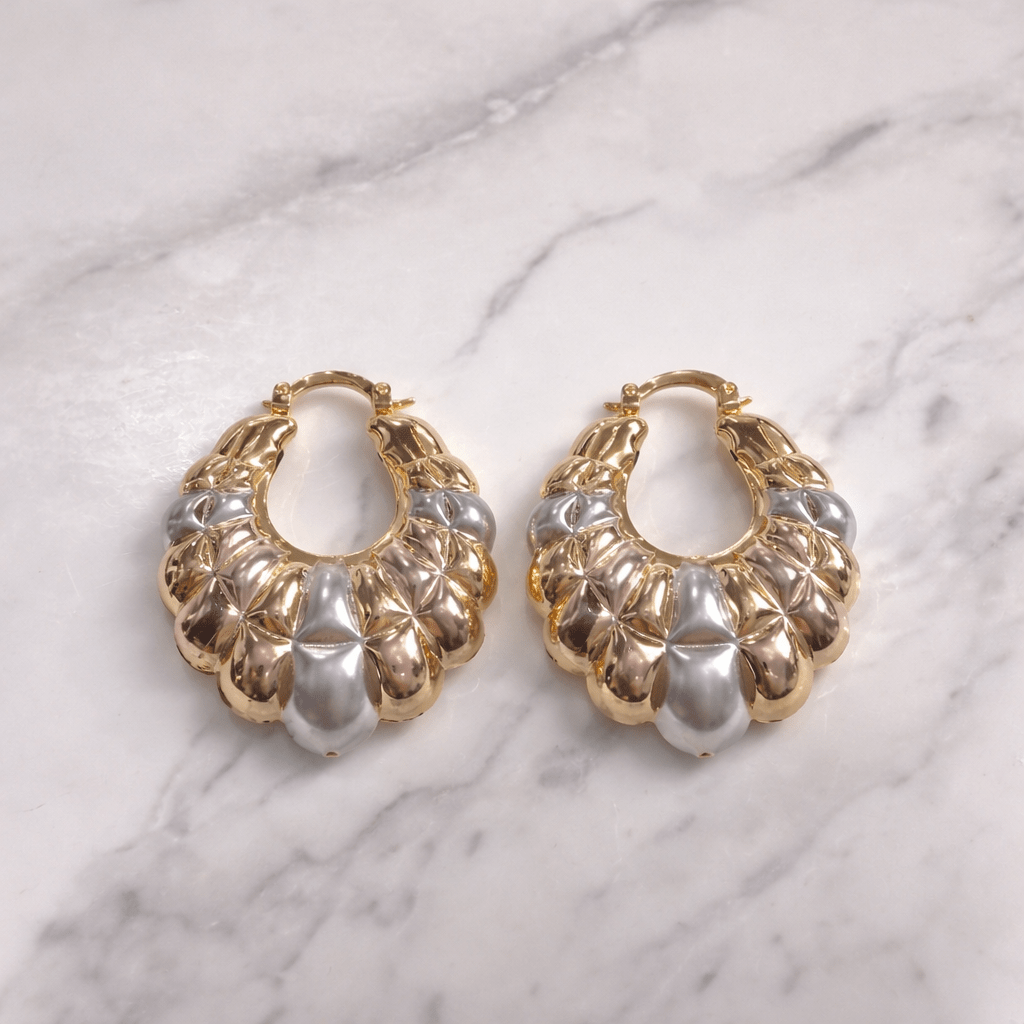 • Clothing: Embroidered/Printed suit for women - Made of best quality fabric - lawn or linen or chiffon - pure silk - Available at Najma Designs & Co. • Jewelry: Gold - plated stud earrings for