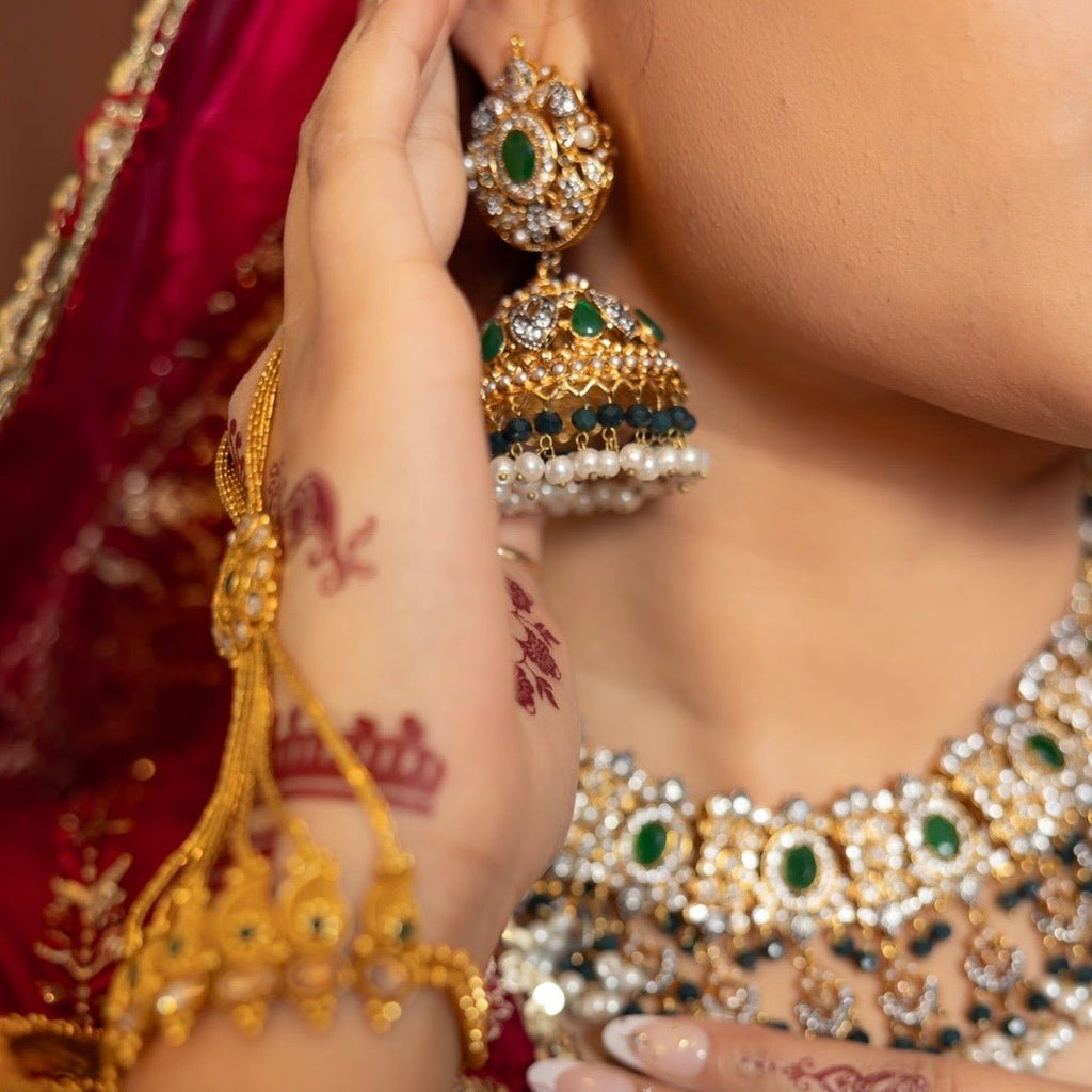 • Clothing: Embroidered/Printed suit for women - Made of best quality fabric - lawn or linen or chiffon - pure silk - Available at Najma Designs & Co. • Jewelry: Gold - plated stud earrings for