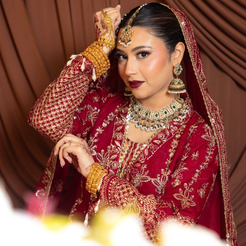 • Clothing: Embroidered/Printed suit for women - Made of best quality fabric - lawn or linen or chiffon - pure silk - Available at Najma Designs & Co. • Jewelry: Gold - plated stud earrings for