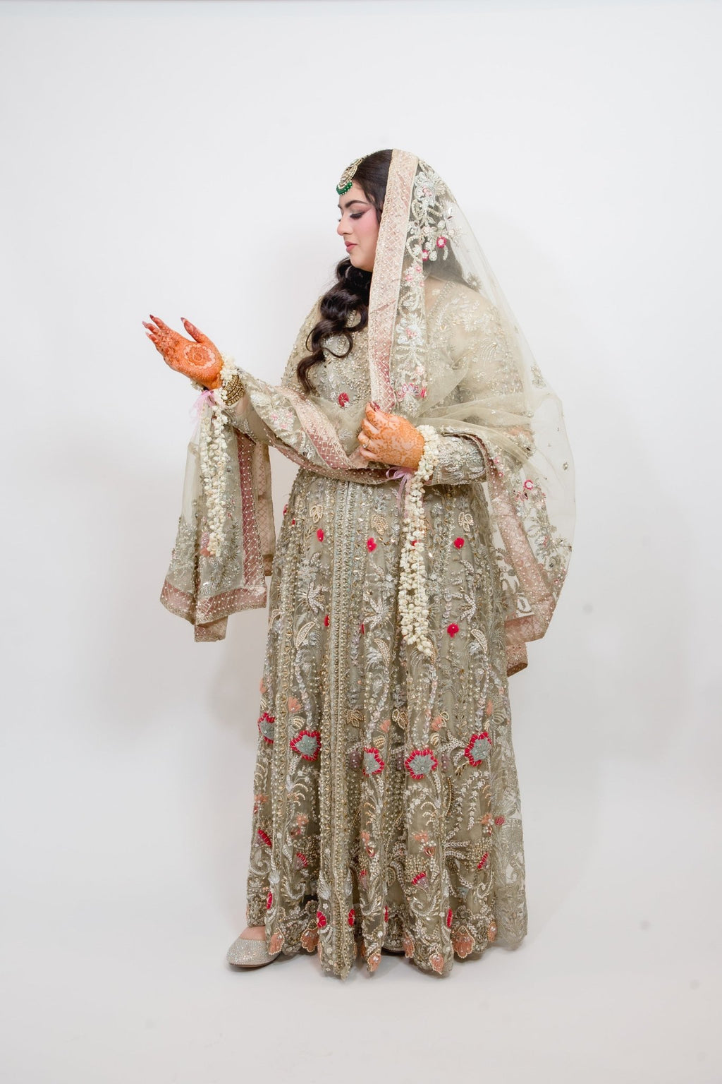 • Clothing: Embroidered/Printed suit for women - Made of best quality fabric - lawn or linen or chiffon - pure silk - Available at Najma Designs & Co. • Jewelry: Gold - plated stud earrings for