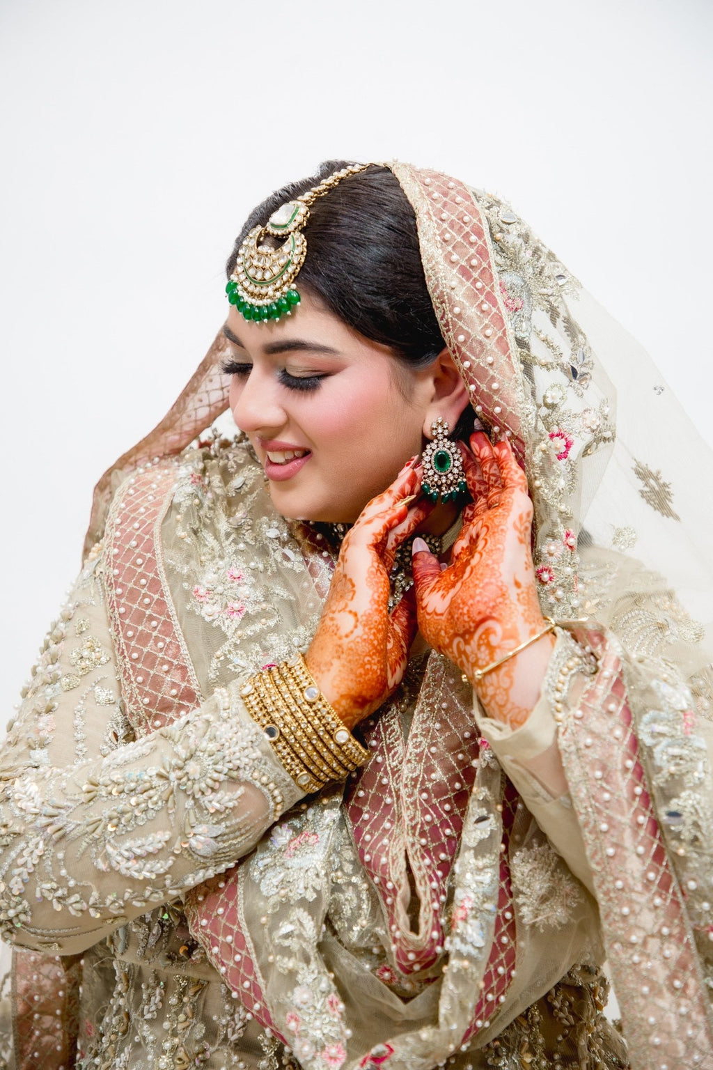 • Clothing: Embroidered/Printed suit for women - Made of best quality fabric - lawn or linen or chiffon - pure silk - Available at Najma Designs & Co. • Jewelry: Gold - plated stud earrings for