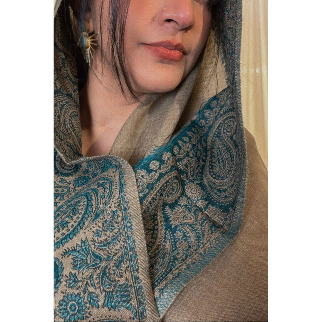 Brown Winter Shawl with Sea Green, Traditional Embroidery Shawl
This camel brown shawl features exquisite sea green embroidery, creating a visually stunning piece. The shawl is available for purchase at Najmadesighns and Co., a reputable online retailer based in the United States.