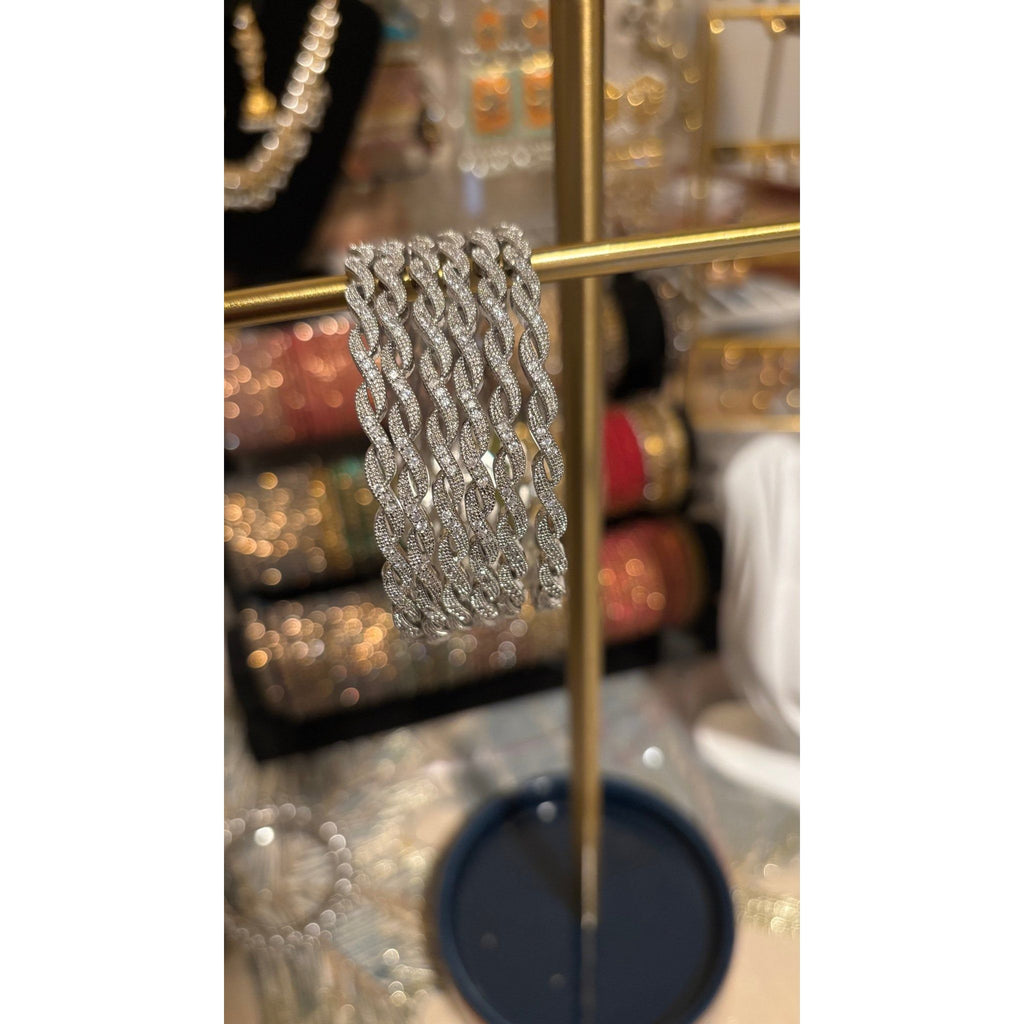 • Clothing: Embroidered/Printed suit for women - Made of best quality fabric - lawn or linen or chiffon - pure silk - Available at Najma Designs & Co. • Jewelry: Gold - plated stud earrings for