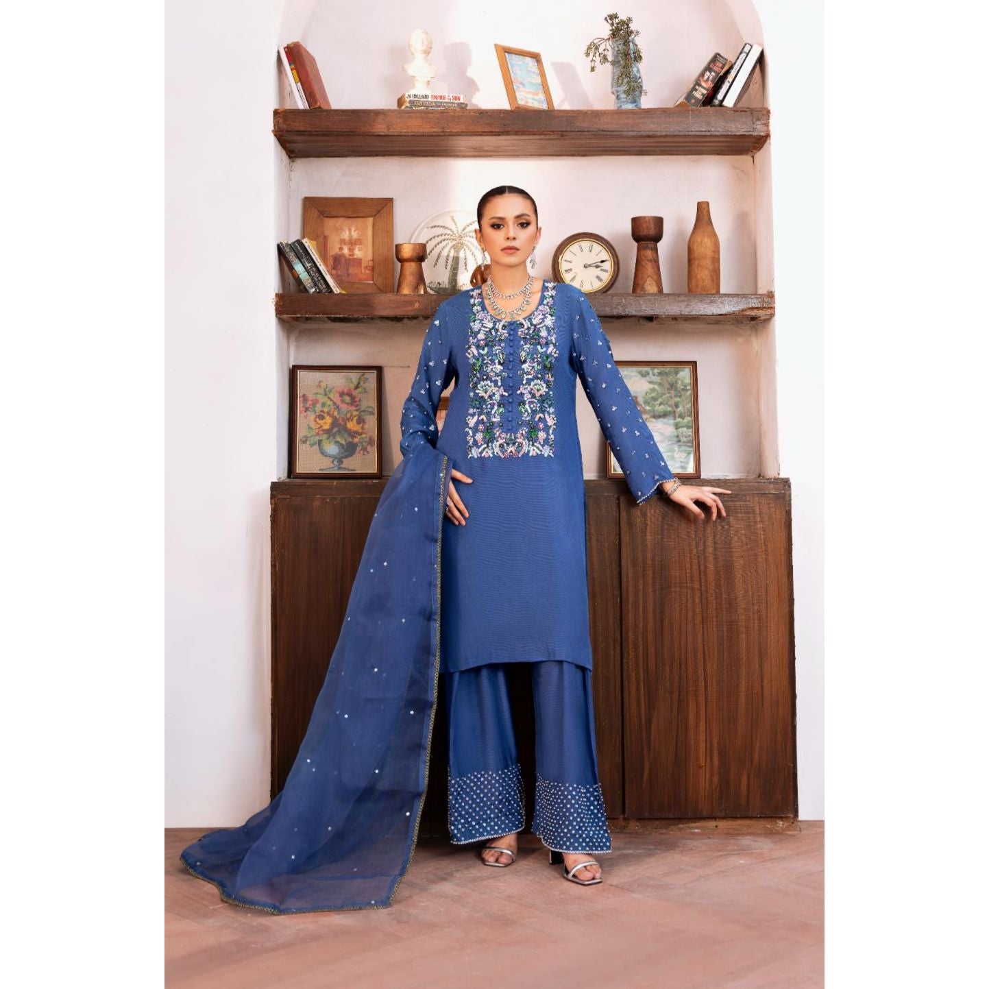 • Clothing: Embroidered/Printed suit for women - Made of best quality fabric - lawn or linen or chiffon - pure silk - Available at Najma Designs & Co. • Jewelry: Gold - plated stud earrings for