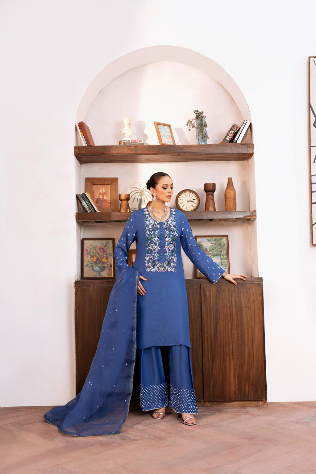• Clothing: Embroidered/Printed suit for women - Made of best quality fabric - lawn or linen or chiffon - pure silk - Available at Najma Designs & Co. • Jewelry: Gold - plated stud earrings for