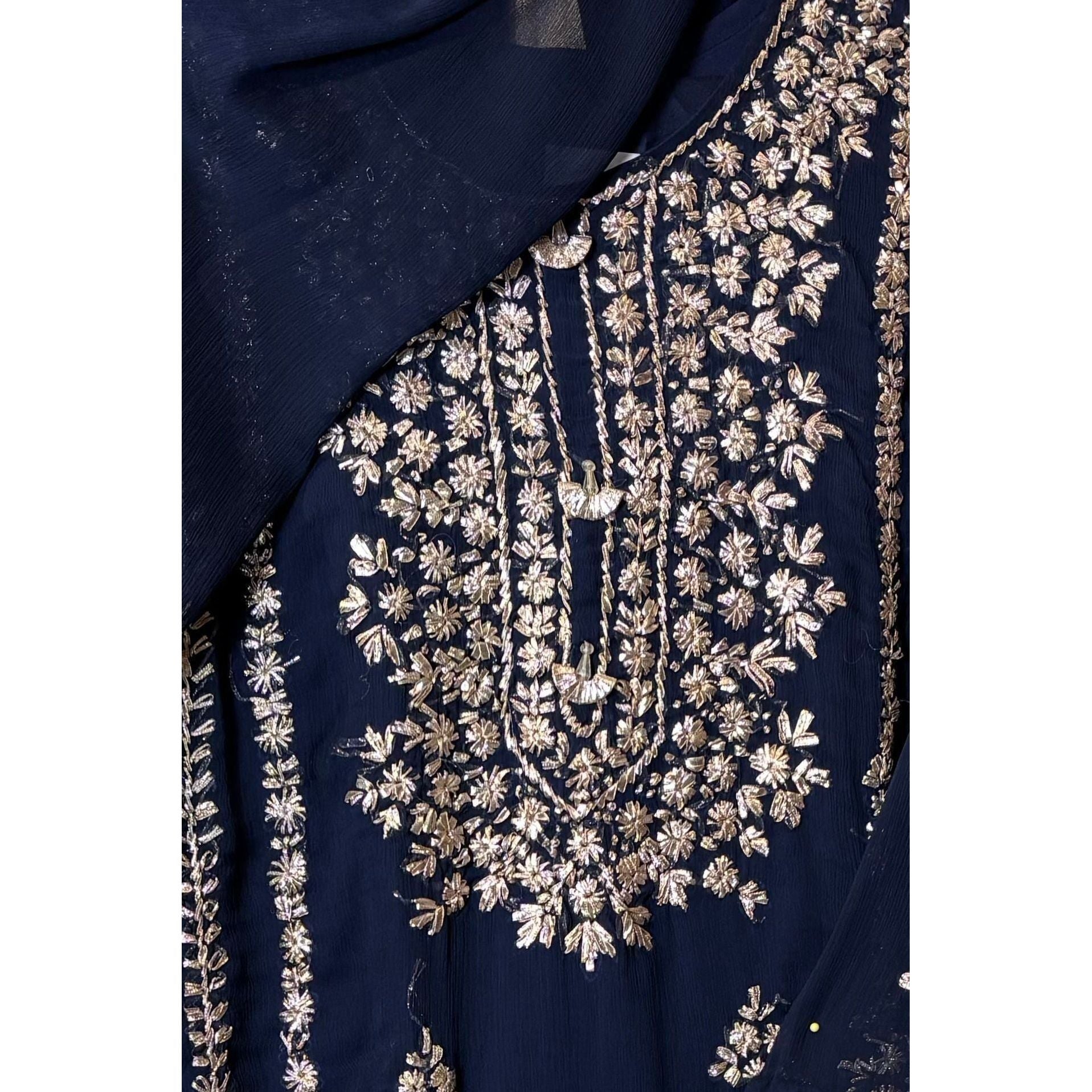 A chiffon fabric navy blue outfit with hand embroidery. by Najmadesigns and co.