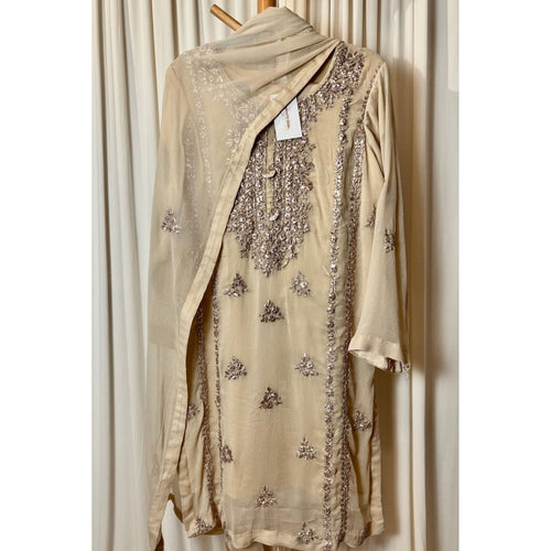 A chiffon fabric off white  outfit with hand embroidery. by Najmadesigns and co. gotta work 