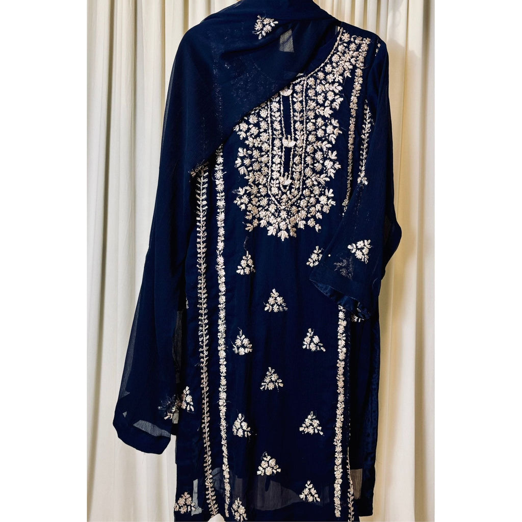 A chiffon fabric blue outfit with hand embroidery. by Najmadesigns and co.