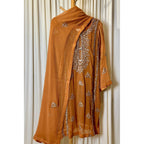 A chiffon fabric burnt orange  outfit with hand embroidery. by Najmadesigns and co. gotta work 