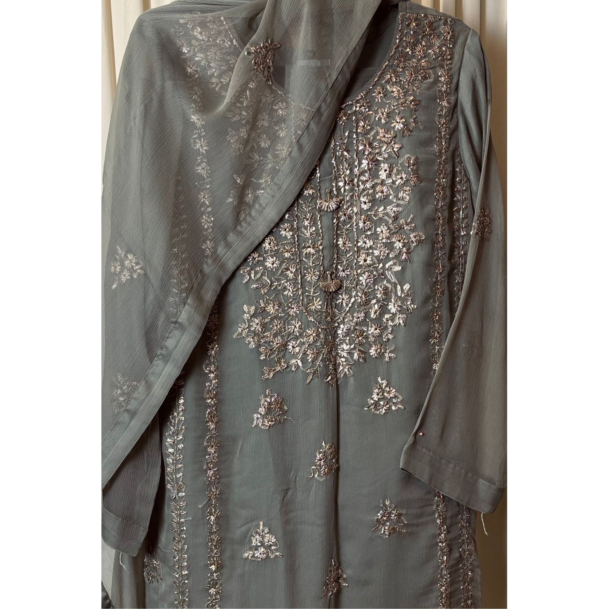 A chiffon fabriclight grey outfit with hand embroidery. by Najmadesigns and co. gotta work 