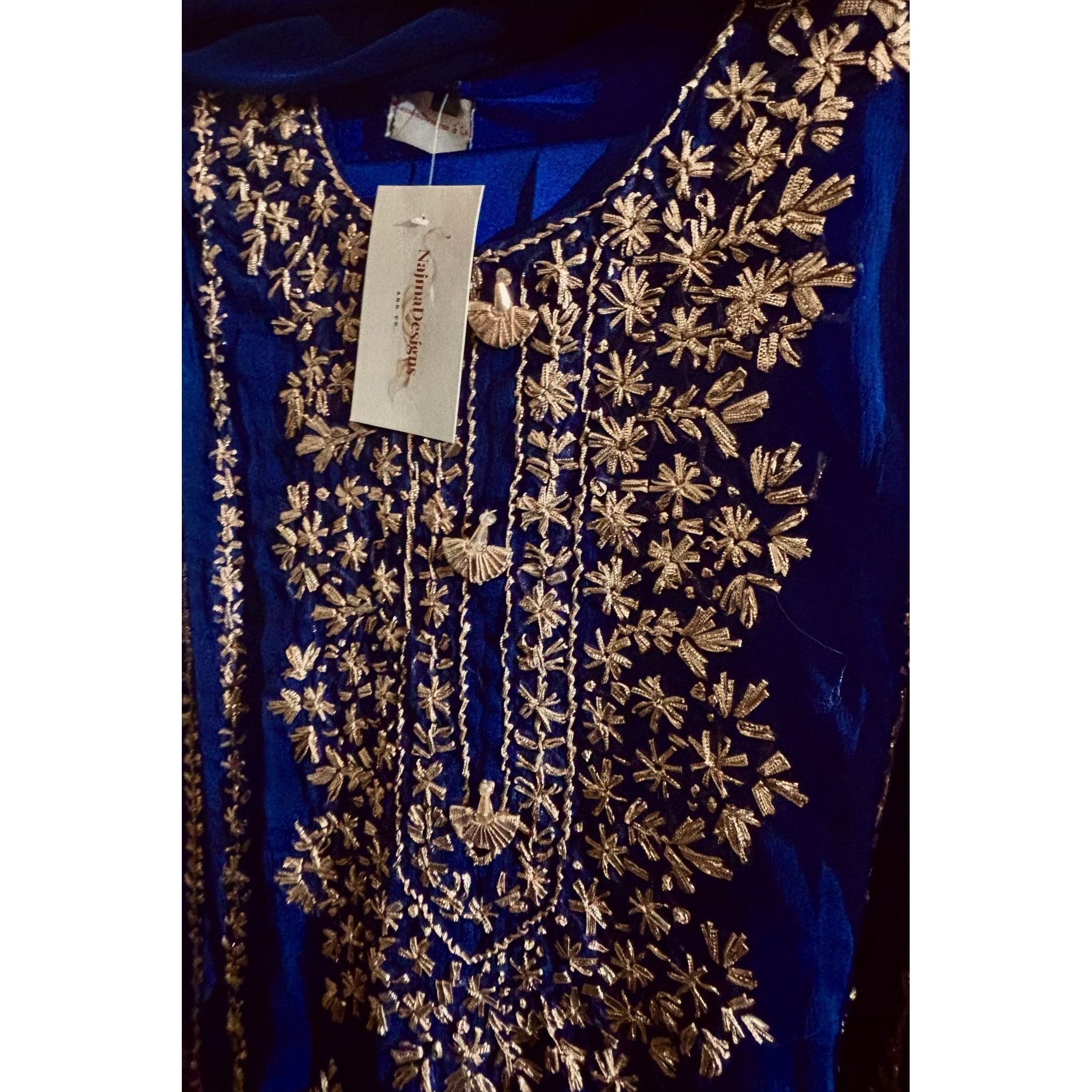 close up of  chiffon fabric blue outfit with hand embroidery. by Najmadesigns and co.