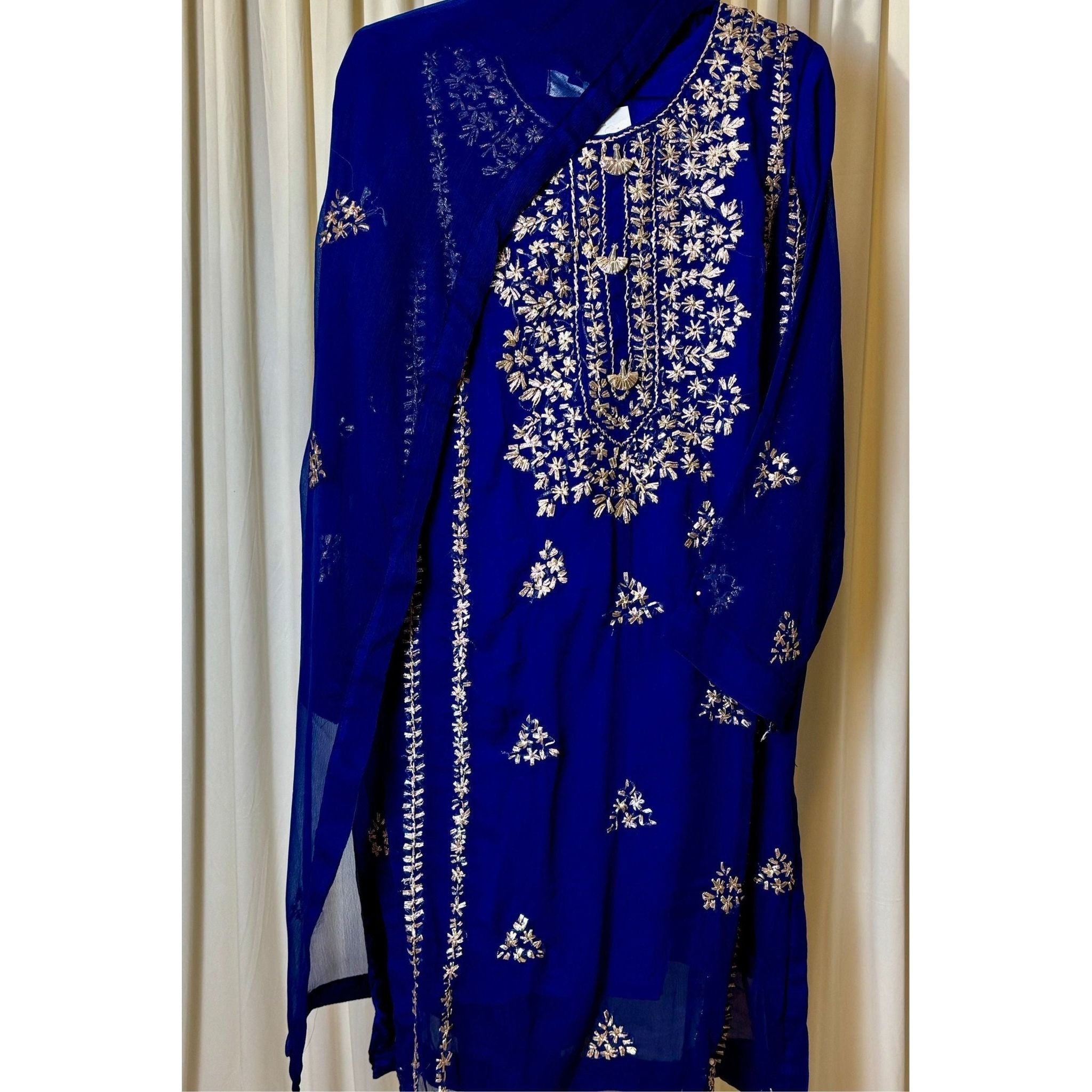 A chiffon fabric blue outfit with hand embroidery. by Najmadesigns and co.
