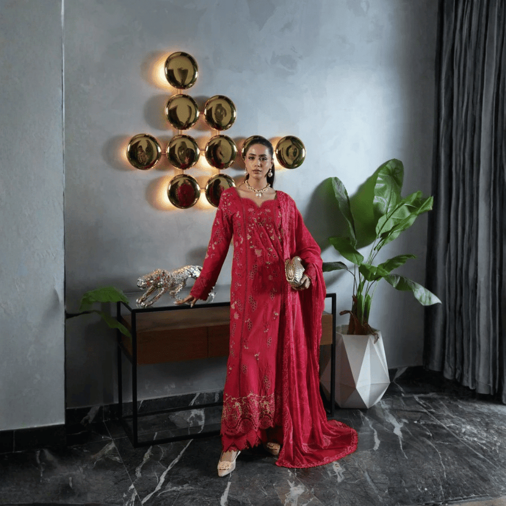 • Clothing: Embroidered/Printed suit for women - Made of best quality fabric - lawn or linen or chiffon- pure silk - Available at Najma Designs & Co. • Jewelry: Gold-plated stud earrings for