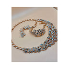 One karat gold plated. This stunning crystal bridal set includes a beautiful bracelet and a stunning, eye-catching necklace. 