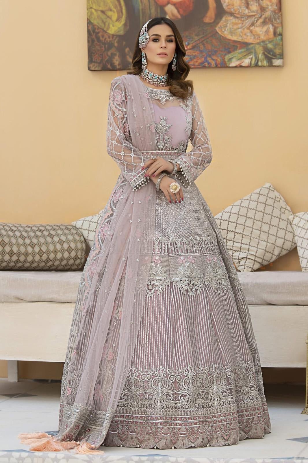 • Clothing: Embroidered/Printed suit for women - Made of best quality fabric - lawn or linen or chiffon - pure silk - Available at Najma Designs & Co. • Jewelry: Gold - plated stud earrings for