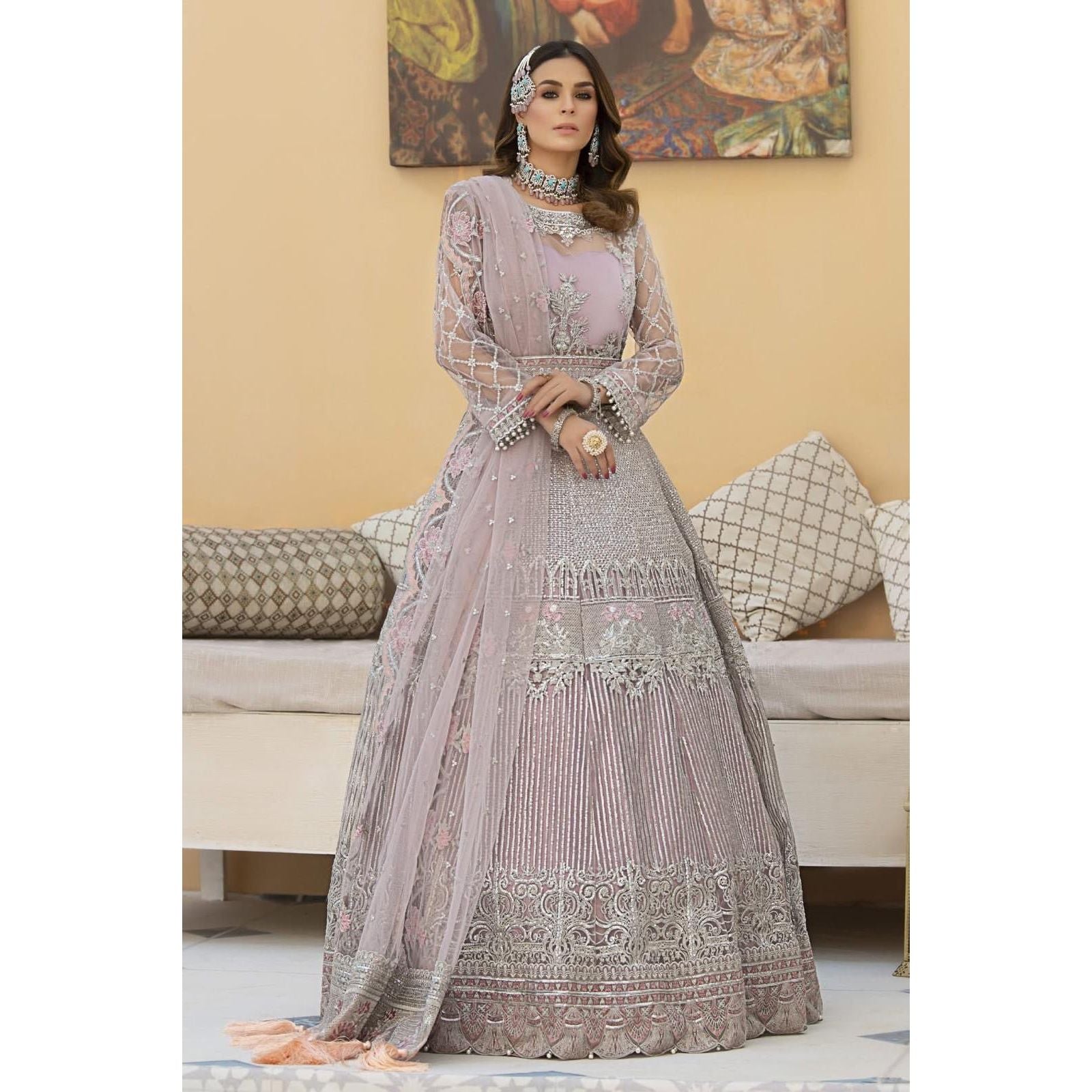 • Clothing: Embroidered/Printed suit for women - Made of best quality fabric - lawn or linen or chiffon - pure silk - Available at Najma Designs & Co. • Jewelry: Gold - plated stud earrings for