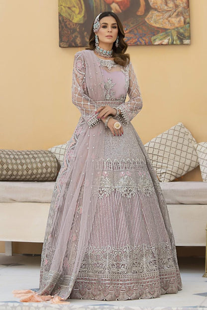 • Clothing: Embroidered/Printed suit for women - Made of best quality fabric - lawn or linen or chiffon - pure silk - Available at Najma Designs & Co. • Jewelry: Gold - plated stud earrings for