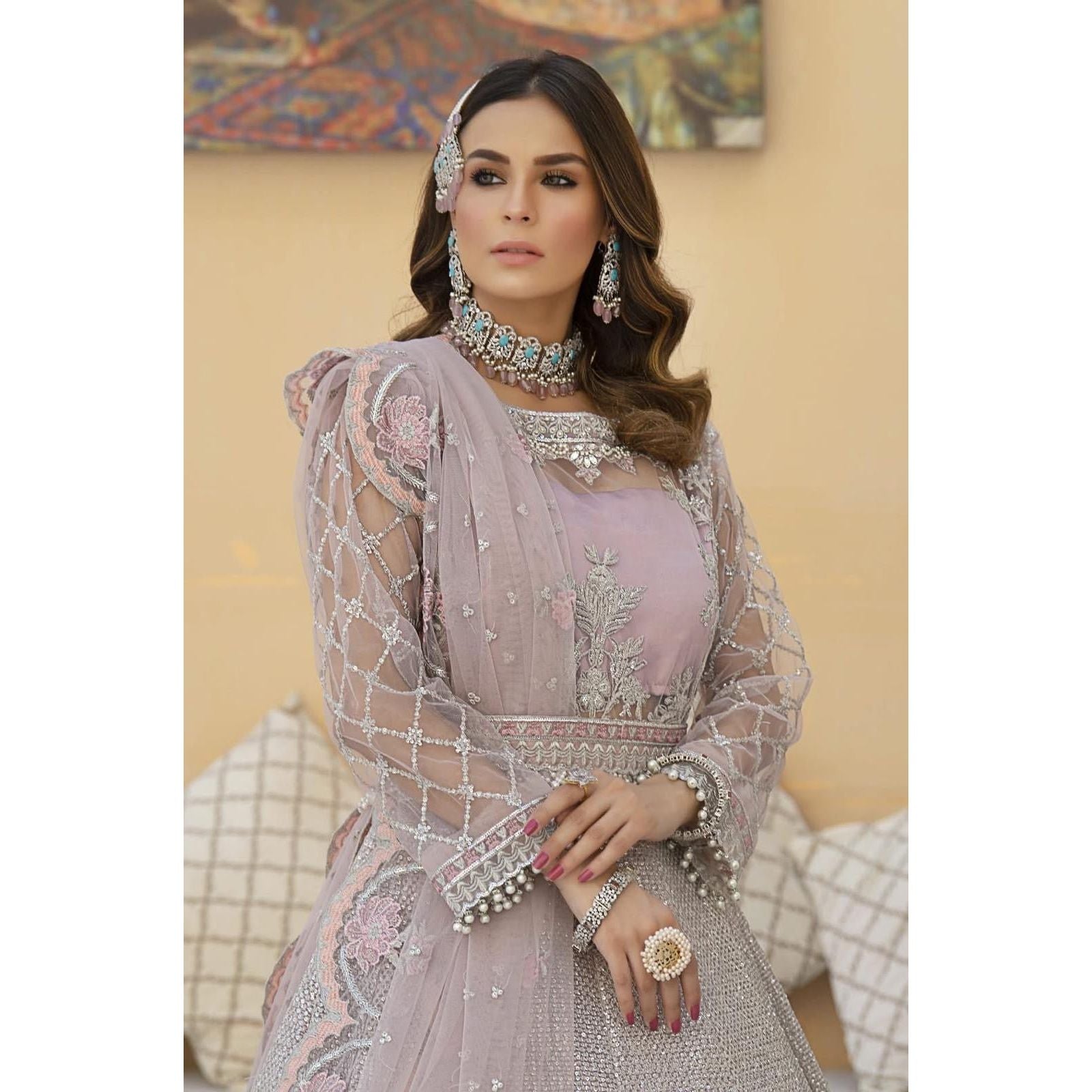 • Clothing: Embroidered/Printed suit for women - Made of best quality fabric - lawn or linen or chiffon - pure silk - Available at Najma Designs & Co. • Jewelry: Gold - plated stud earrings for